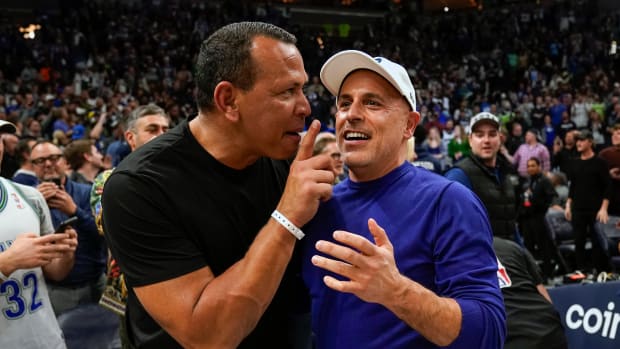 Rodriguez and Lore after the Timberwolves' 109-104 win over the Clippers in a play-in game on April 12, 2022.